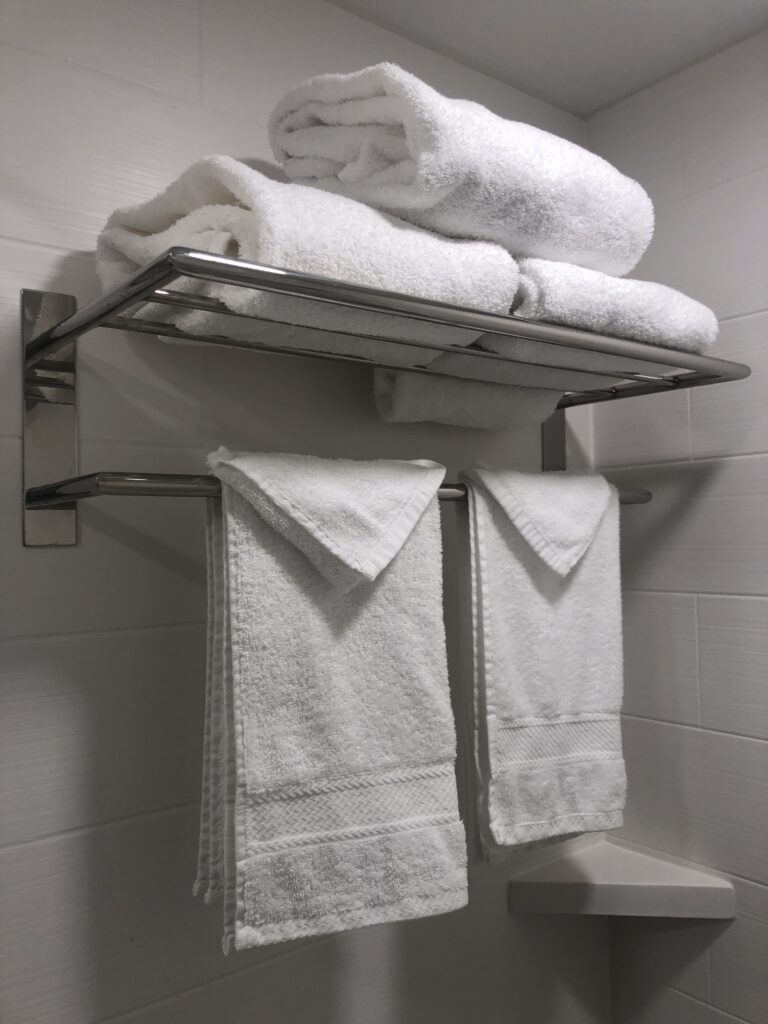 a towel rack with towels on it