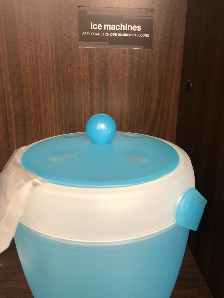 a blue and white container with a lid