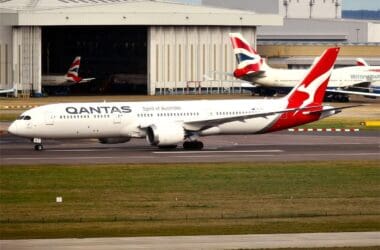 a large white airplane on a runway