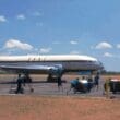 a group of people walking on a runway