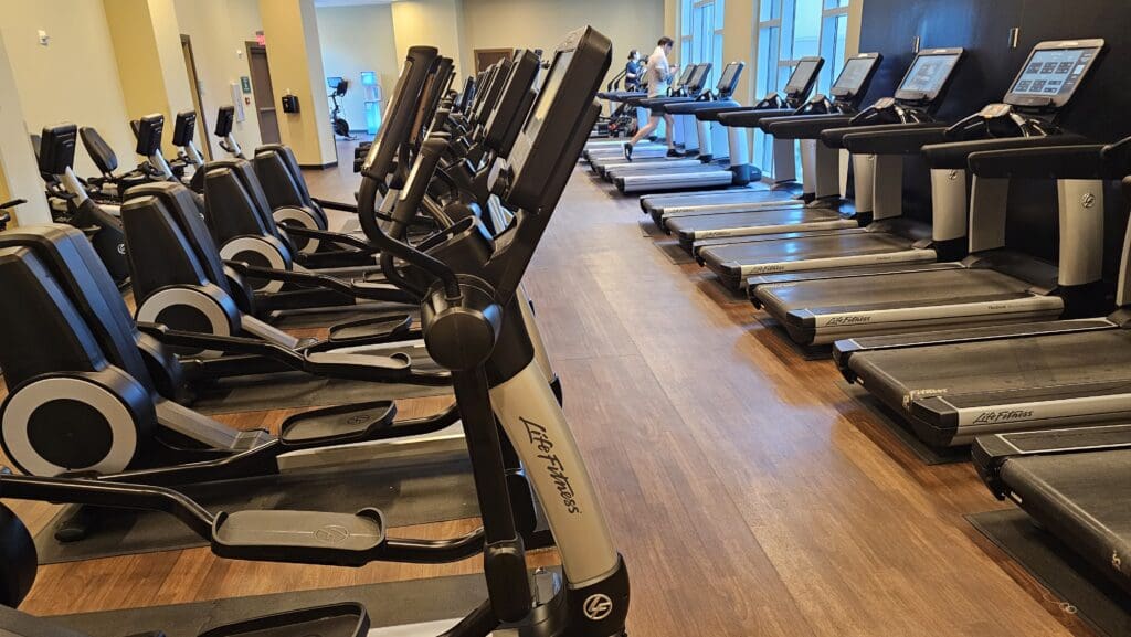 a group of treadmills in a gym