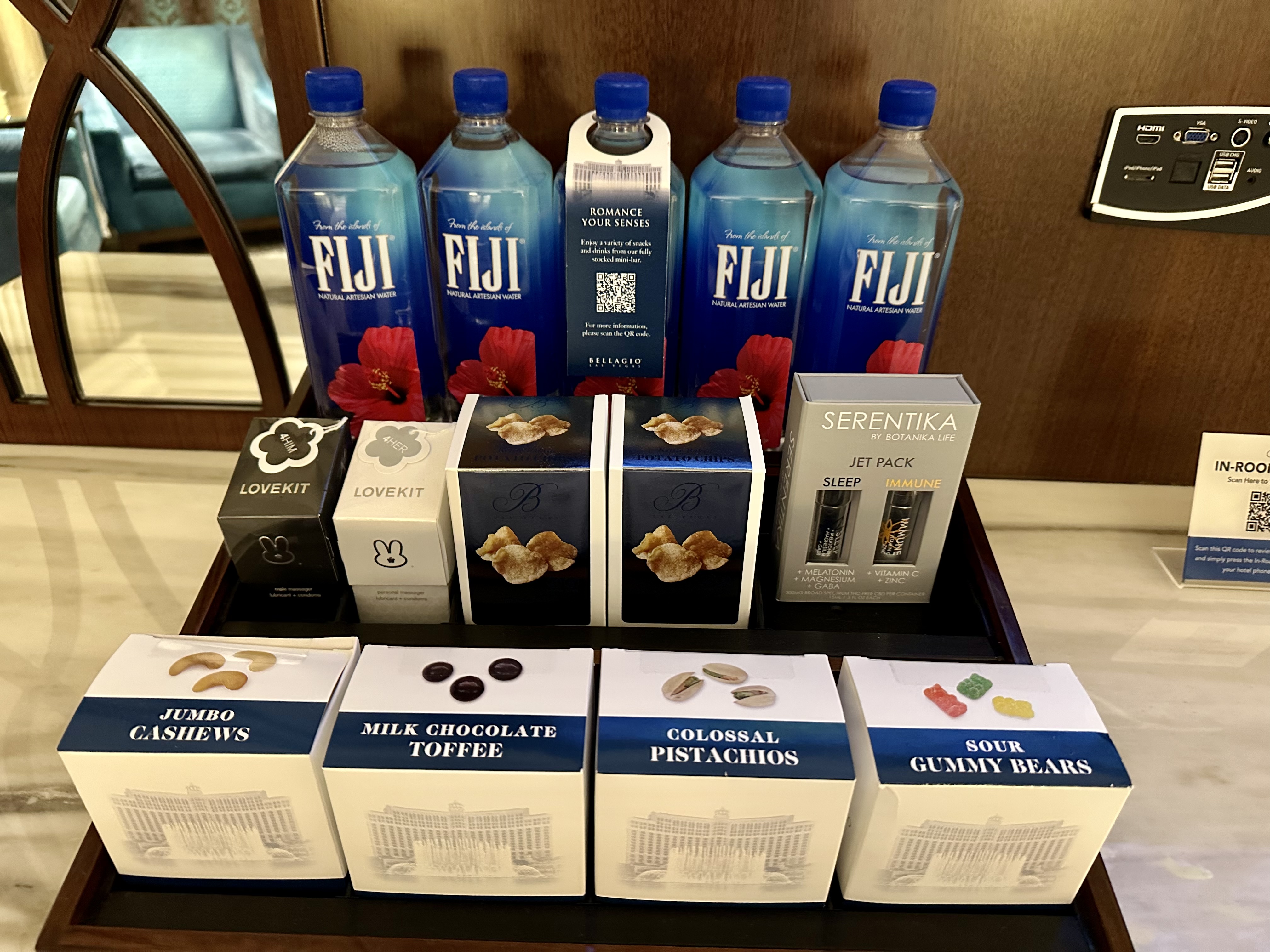 a group of boxes and bottles of water