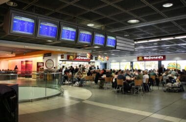 a group of people eating at a restaurant