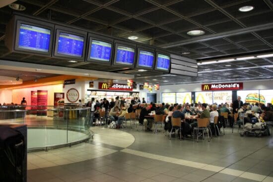 a group of people eating at a restaurant