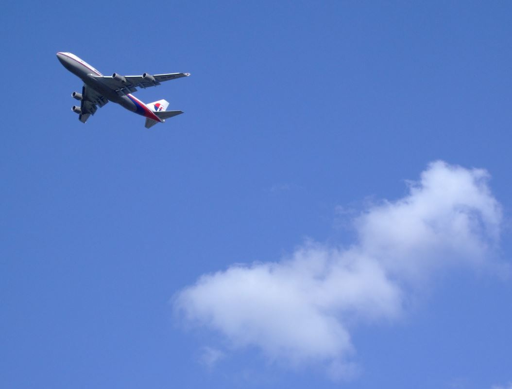 an airplane flying in the sky