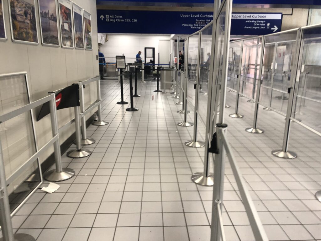 a line of barriers in a airport