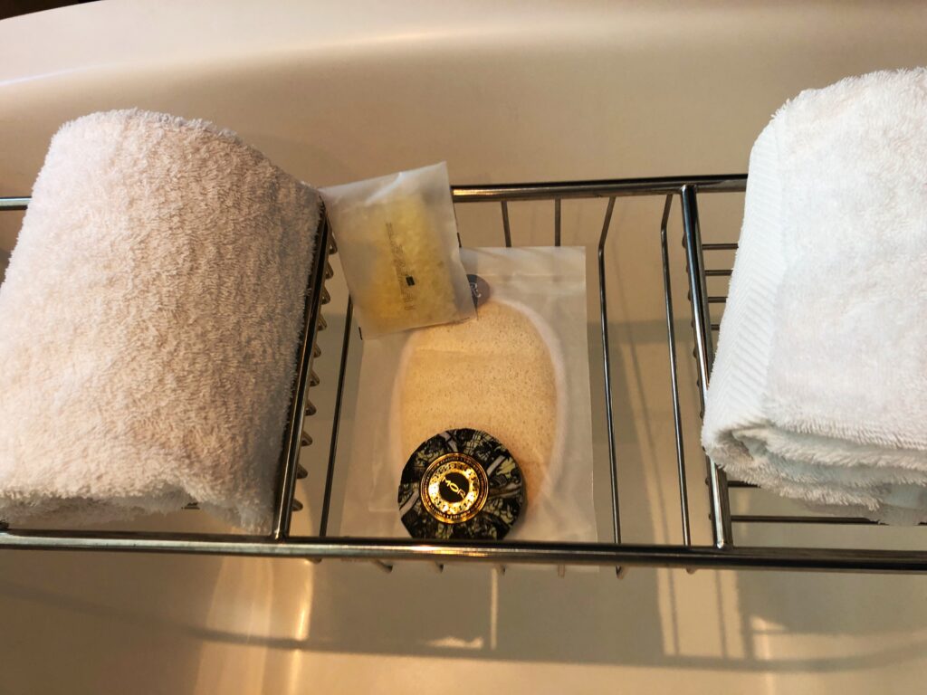 a towel and a towel on a bathtub