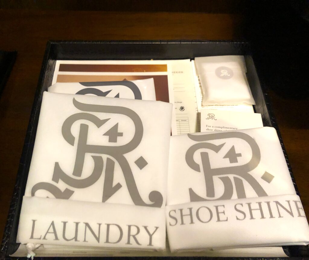 a box with white towels and a few other items