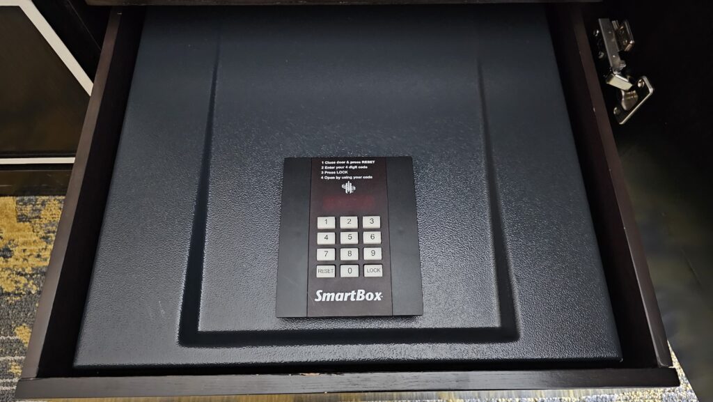 a black safe with a black rectangular object