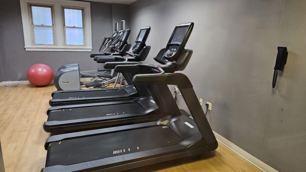 a group of treadmills in a room