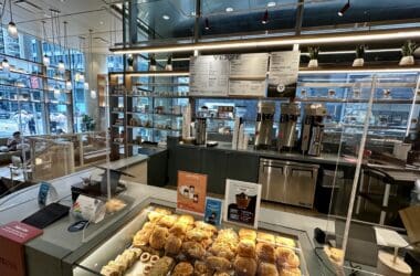 a bakery with a glass display case