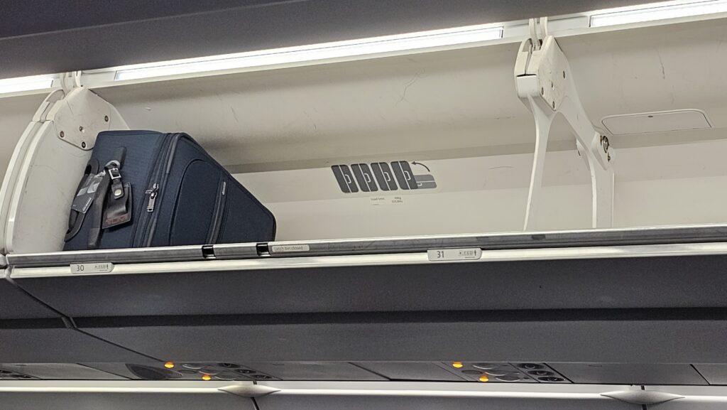 a suitcase on a shelf
