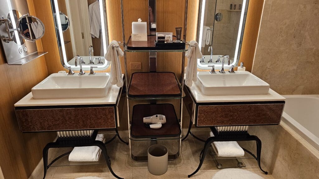 a bathroom with a mirror and two sinks