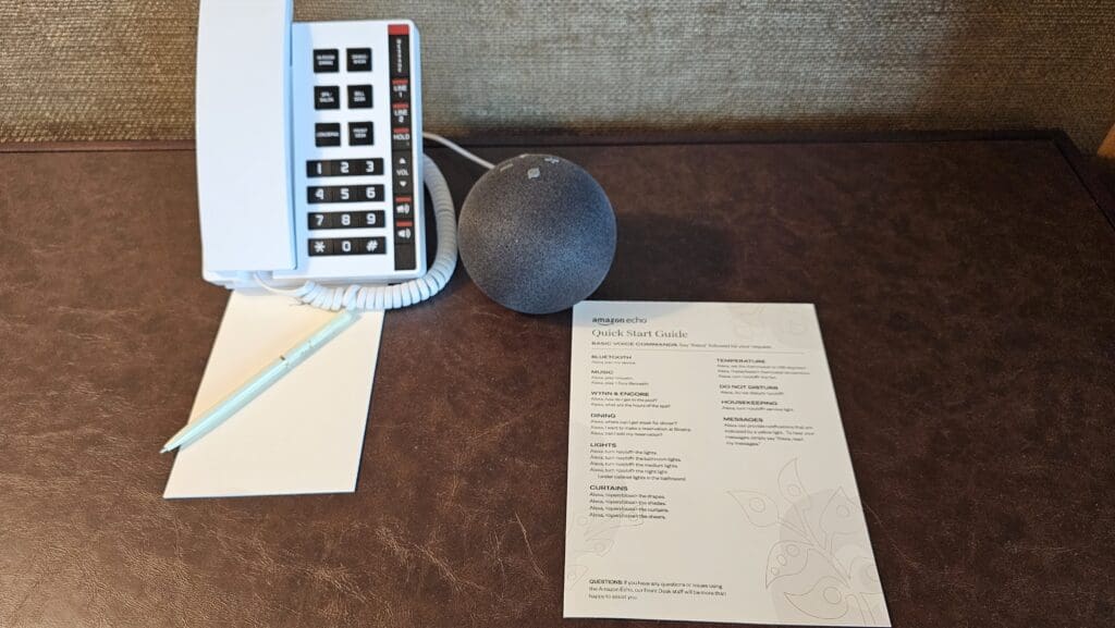 a telephone and a paper on a table