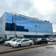 a building with cars parked in front of it