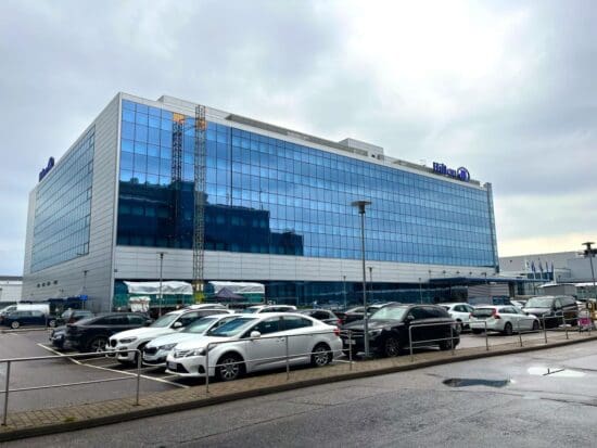 a building with cars parked in front of it