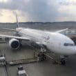 a large white airplane on a tarmac