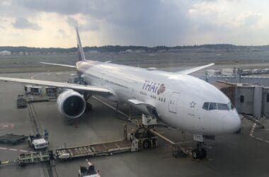 a large white airplane on a tarmac