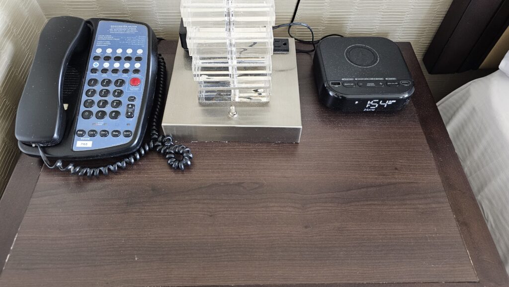 a telephone and a box on a table