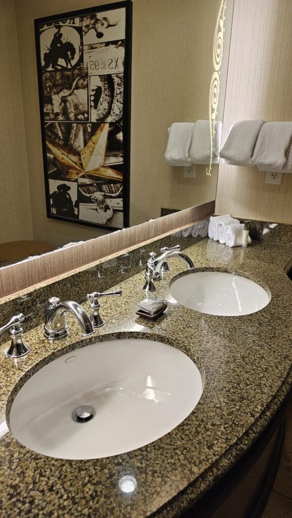 a bathroom with a mirror and sinks