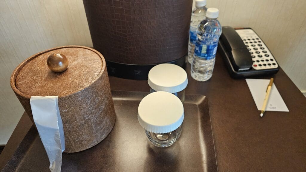 a group of jars on a tray