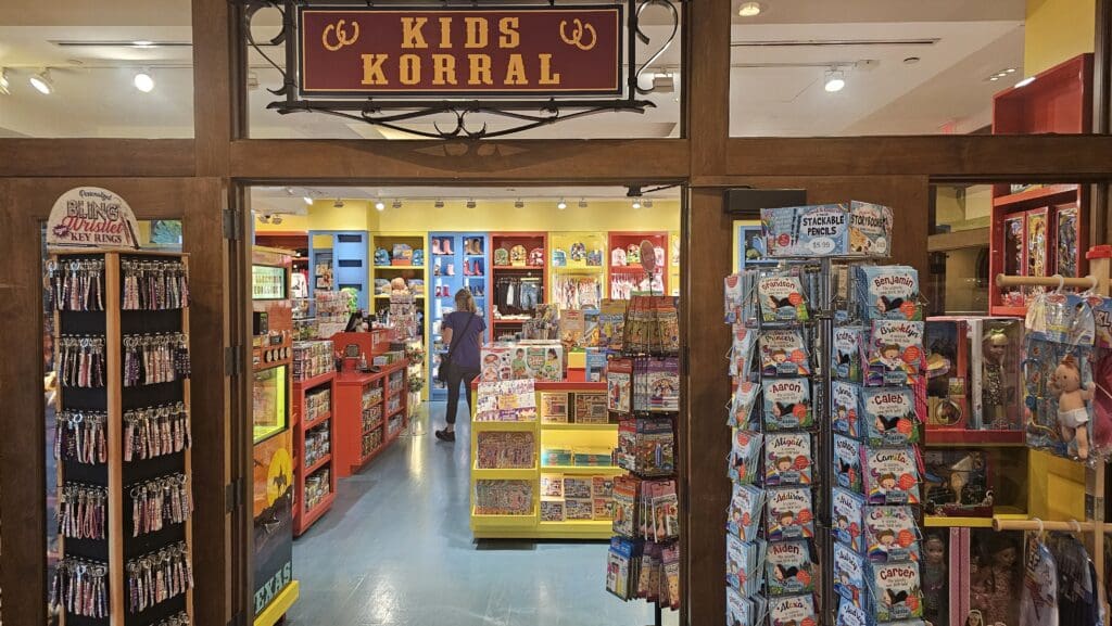 a store with a sign and shelves of books