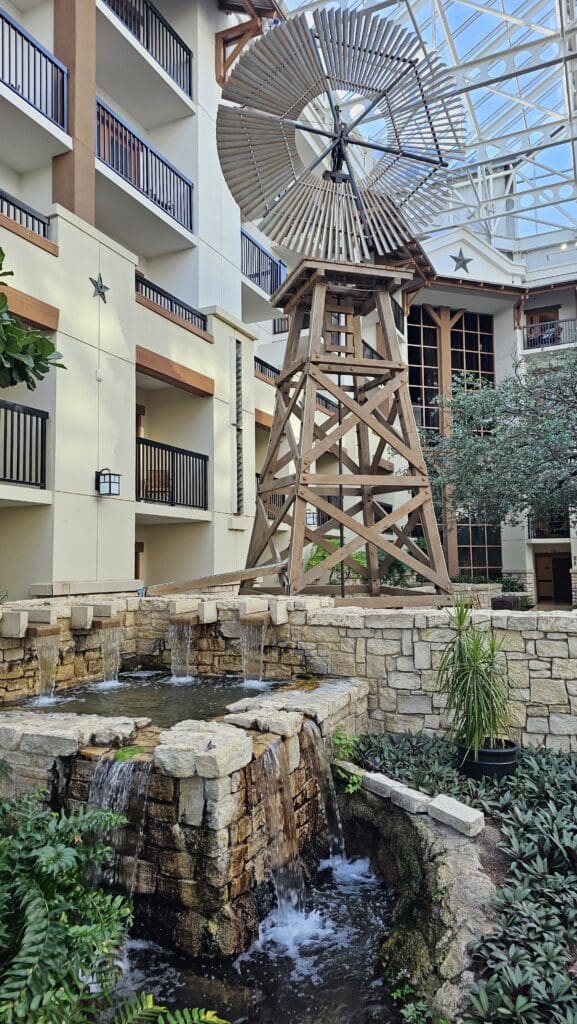 a water fountain in front of a building