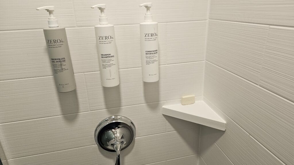 a group of shampoo bottles on a wall