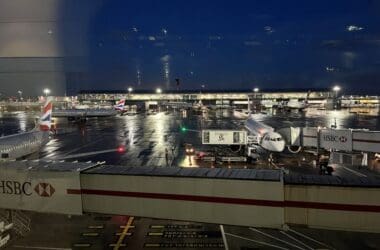 an airport with airplanes parked on the ground