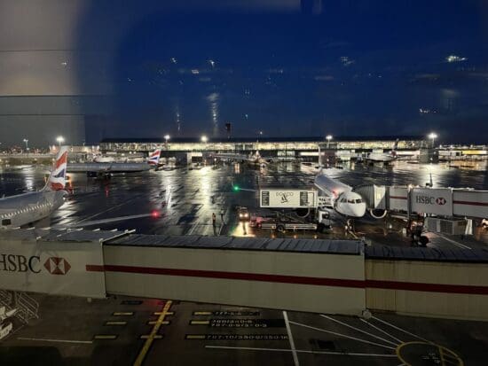 an airport with airplanes parked on the ground