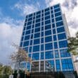 a tall building with blue windows