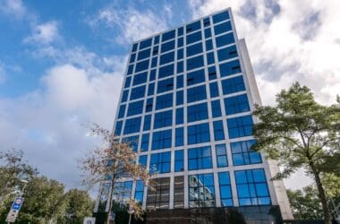 a tall building with blue windows