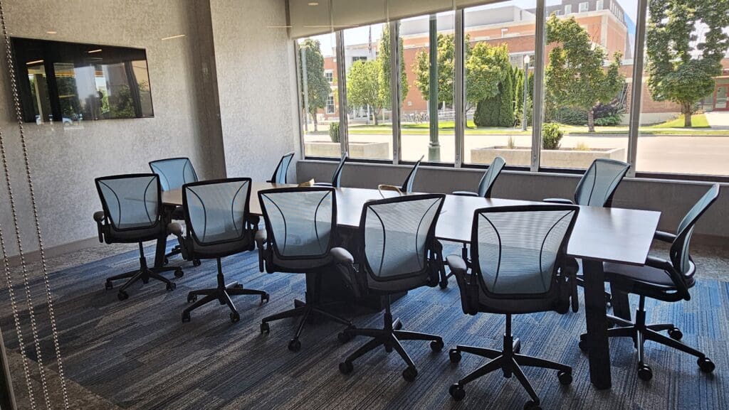 a conference room with chairs and a table