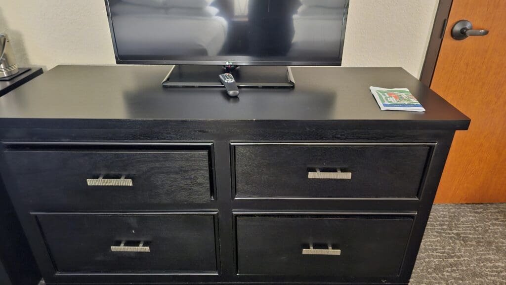 a tv on a dresser