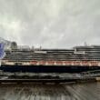 a large cruise ship on a dock