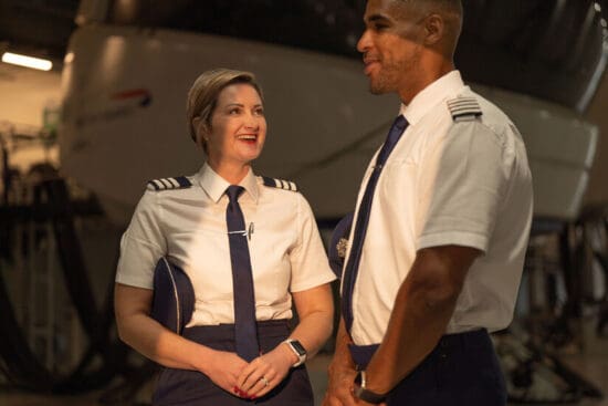 a man and woman in uniform