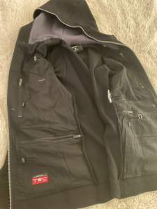 a black jacket with a zipper
