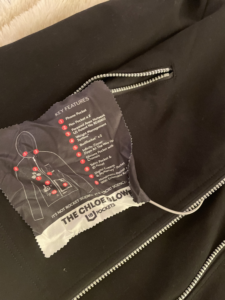 a black jacket with a label on it