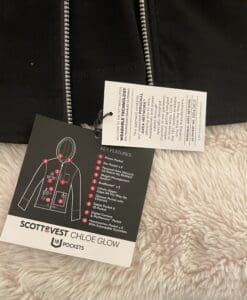 a black jacket with a white tag