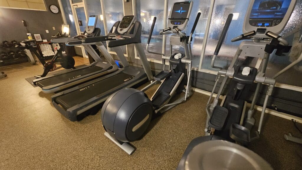 a group of treadmills in a room