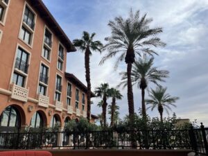 a building with palm trees