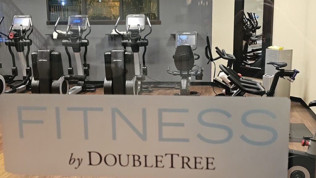 a group of exercise bikes in a room