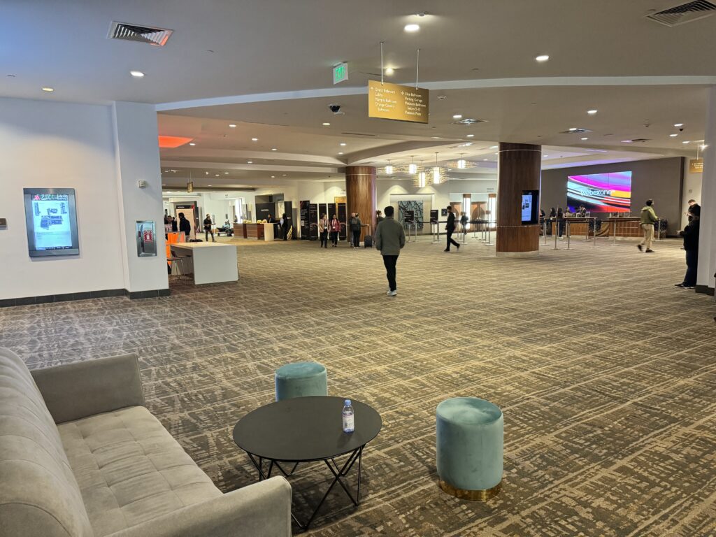 a large room with a couch and tables