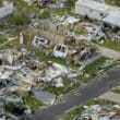 a destroyed house and a road