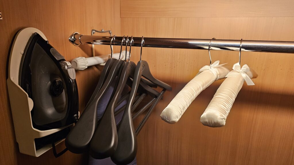 swingers and a pair of white gloves on a rack