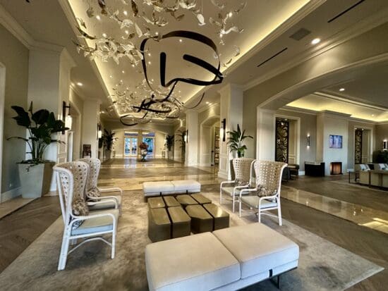 Park Hyatt Aviara lobby with chairs and a chandelier