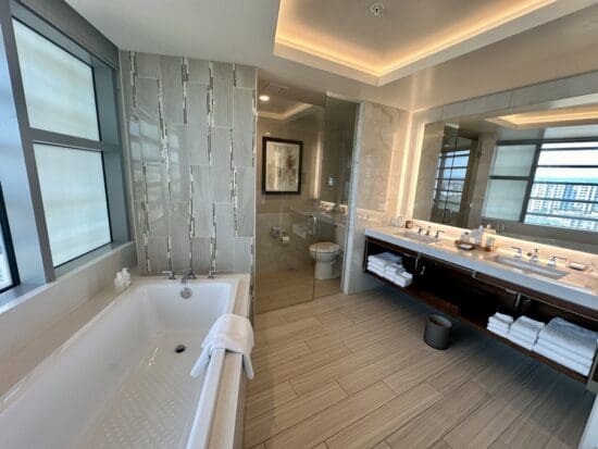 a bathroom with a bathtub and sink