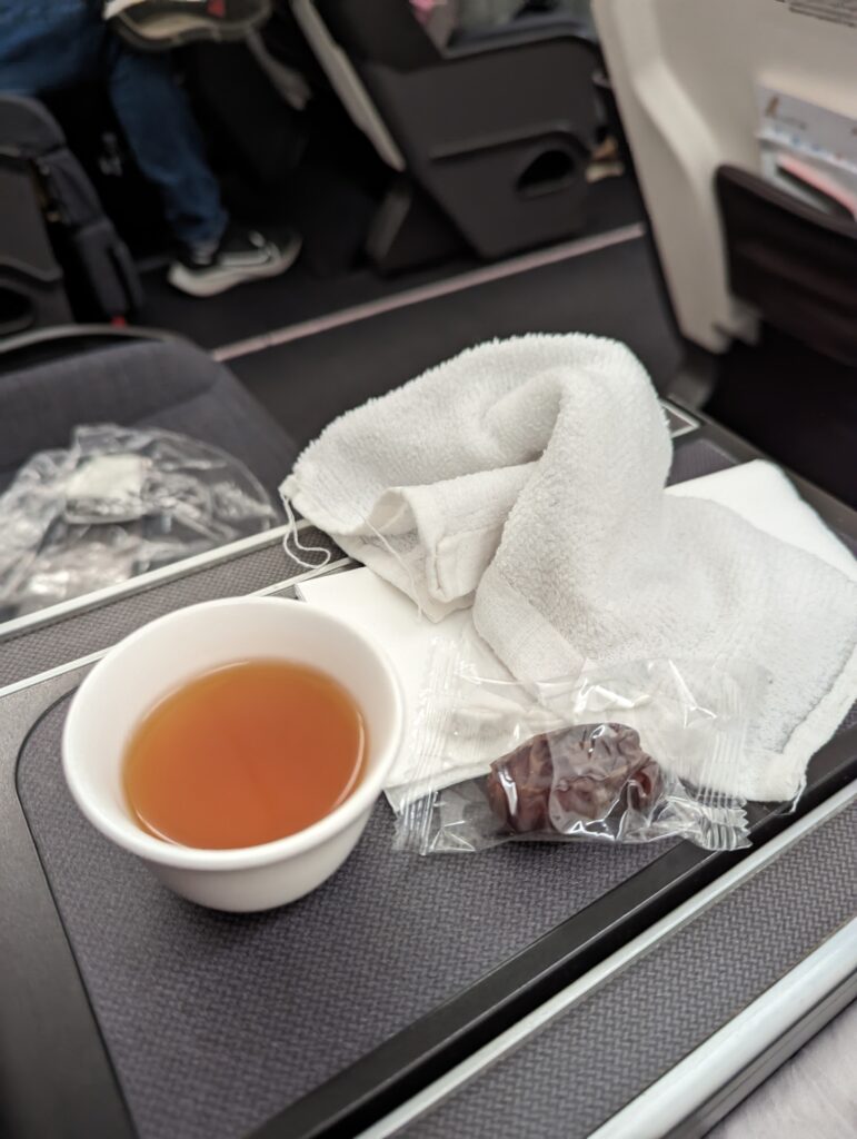 Gulf Air Arabic Coffee Juice, Dates and Hot Towel