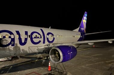 a plane on the runway at night