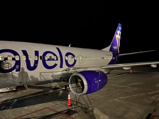 a plane on the runway at night